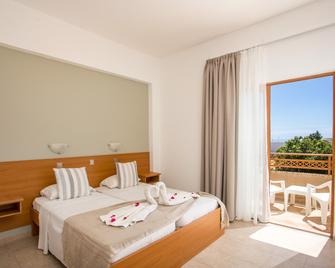 Ledras Beach Hotel - Gennadi - Bedroom