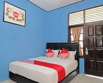 OYO 950 Steze Kost Syariah - Jambi - Bedroom
