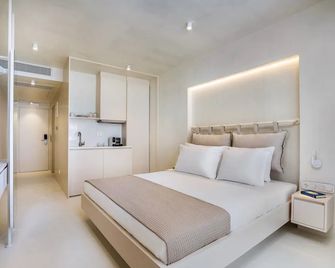 Cocoons Luxury Suites & Villas - Fourka - Bedroom