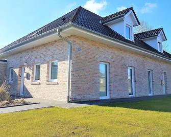 Vacation home Südwind - Maisonette apartment no. 2 - Rhauderfehn - Gebäude