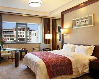 Inn Fine Hotel - Dalian - Bedroom