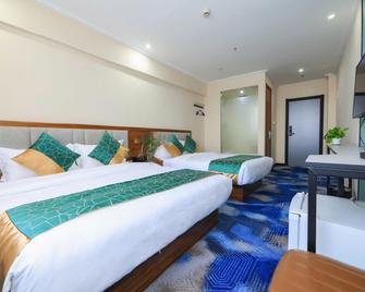 songyue Hotel (Harbin Chengde Square Chinese Baroque Store) - Harbin - Bedroom