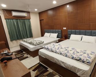 Hotel Cosy Inn - Digha - Schlafzimmer