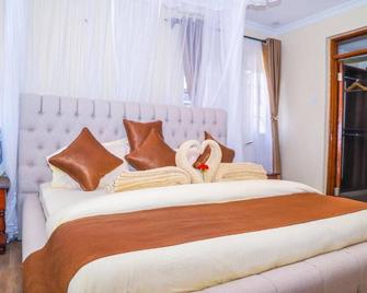 Villa Winga Deluxe Hotel - Kisumu - Bedroom