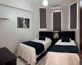 Hotel Libano - San Francisco de Macorís - Camera da letto