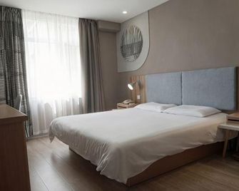 Homeinn Pebble Hotel (Fushun North Station Yong'an Bridge) - Фушунь - Спальня