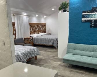Suites - Puerto Ayora - Bedroom