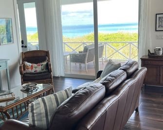 New - Beach Front Raised Villa-Views From Every Room & Whole House Generator! - Treasure Cay - Living room