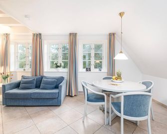 Upper floor apartment on 2 levels, up to 4 persons, with beach chair in the garden - Norddorf - Essbereich