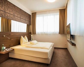 Hotel Römerstube - غراتس - غرفة نوم