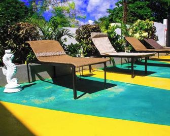 A Rooftop View, Comfort & Event-Ready Spaces - #14 - Negril - Innenhof