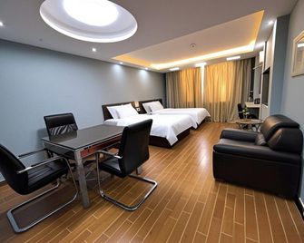 Hengsheng Hotel - Yan’an - Camera da letto
