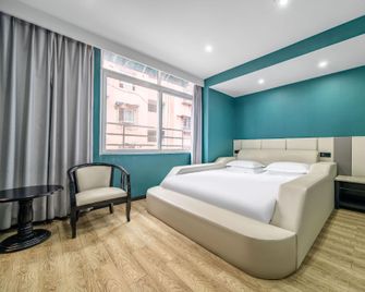 Orange Hotel (Second People's Hospital Branch) - Yibin - Slaapkamer