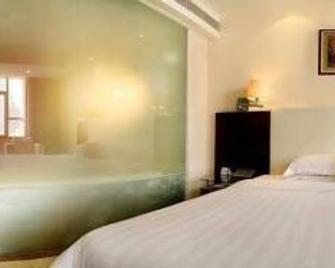 Jolly Hotel - צ'נגשה - חדר שינה