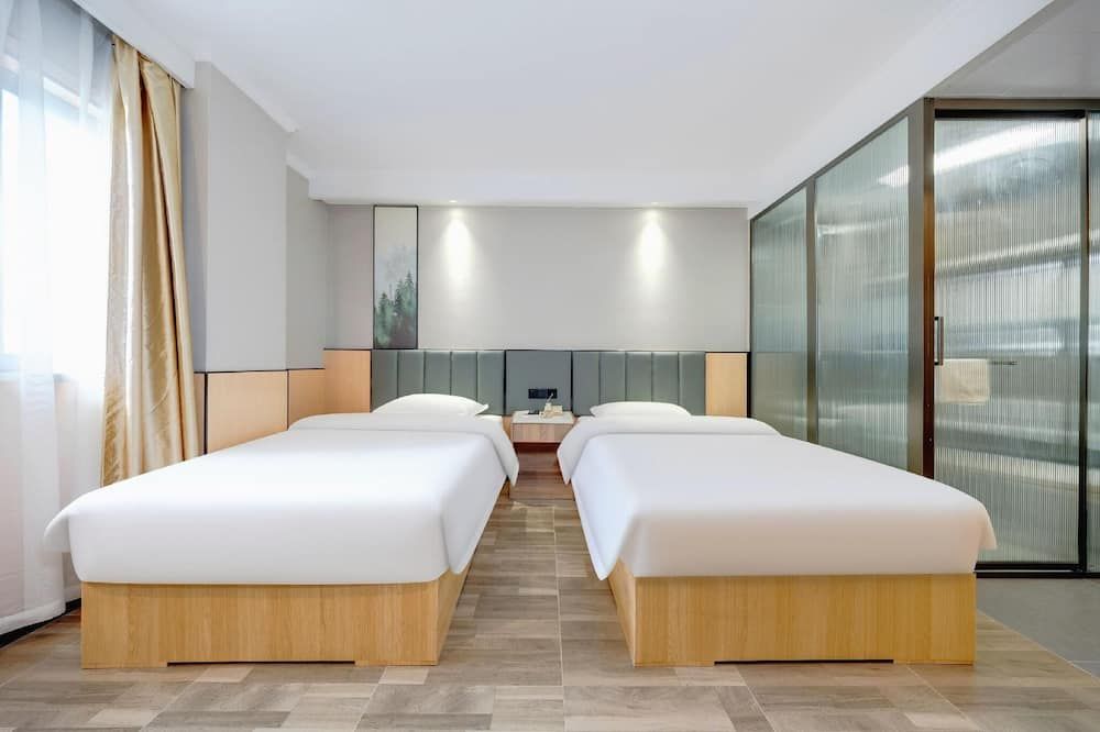 Greentree Inn Jiangsu Nanjing Olympic Sports Center Express Hotel - نانجينغ - غرفة نوم