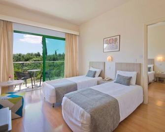 Natura Beach Hotel and Villas - Polis Chrysochous - Slaapkamer