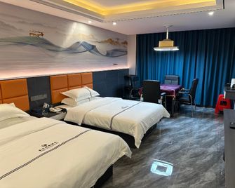 Xingyue Fashion Inn (Danzhou Summer Plaza Branch) - Danzhou - Habitación