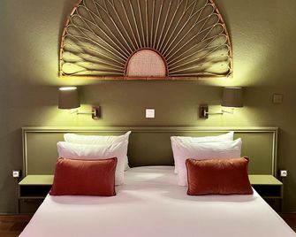 Cit'Hotel le Louvre - אורנג' - חדר שינה