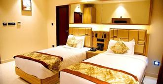 Vybrant Hotels - Vijayawada - Bedroom