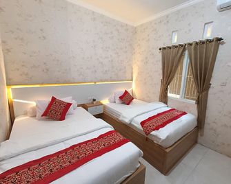 D'Kost Syariah - Jember - Slaapkamer