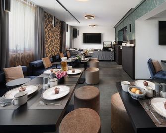 We rooms Hotel - Karben - Restaurant