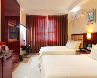 Xinlianxin Hotel - Xinxiang - Schlafzimmer