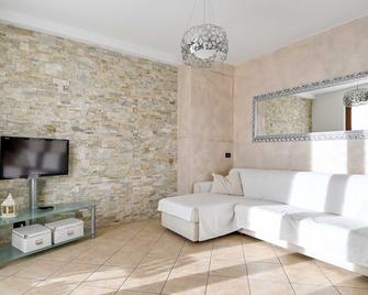 Casa Pierina - Lake View - by Host4U - Costa Volpino - Living room