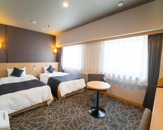 Garden Hotel Kanazawa - קאנאזוואה - חדר שינה