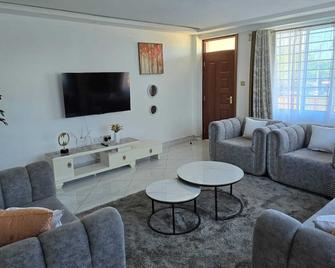 Roam Apartments - Kisumu - Living room