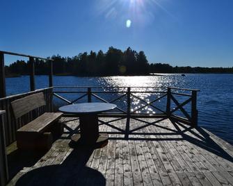 West bank location directly on the lake with sun terrace, sauna and boat - Ryd - Balcón