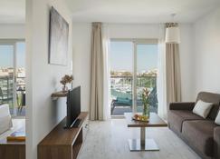 Porto Drach Aparthotel & Suites - Porto Cristo - Wohnzimmer