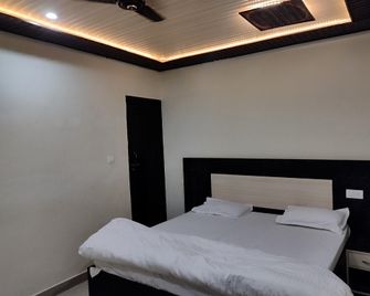 Arvind Conference Halls - Jhānsi - Bedroom