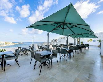 Plaza Regency Hotels - סליאמה - מסעדה