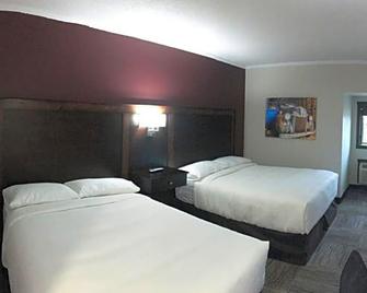 Homestead Inn & Suites - Vanderhoof - Bedroom