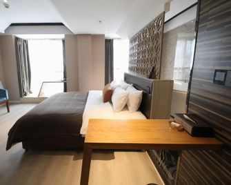 sinweier hotel - Mianyang - Camera da letto