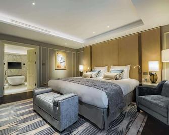 Grand Hotel Kempinski Riga - Riga - Schlafzimmer