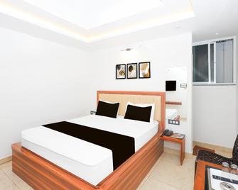 Super Hotel O Deluxe - Ranchi - Slaapkamer