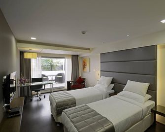 Hotel Grande 51 - Navi Mumbai - Schlafzimmer