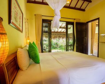 Red Flower Cottages Homestay - Hoi An - Habitación