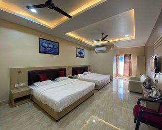 Grace Inn - Guwahati - Bedroom
