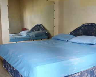 Holiday Bir - Ambon - Bedroom
