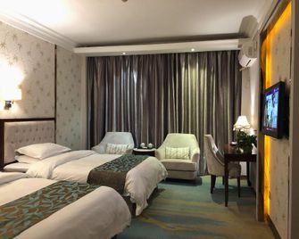 Zhongshan International Hotel - Ganzhou - Bedroom