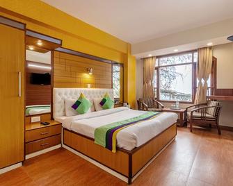 Treebo Varuna With Mountain View - Shimla - Bedroom