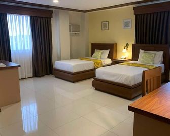 Surigao Royal Regency Suites - Surigao - Habitación