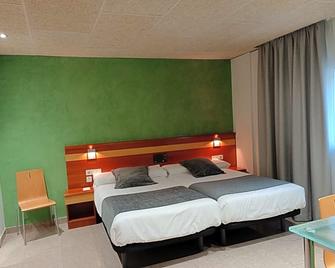 Hotel Iris - Granollers - Schlafzimmer
