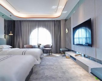 Royal International Hotel - Ürümqi - Bedroom