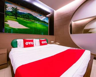 OYO 502 Bangsean Hotel - Chonburi - Bedroom