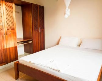 Nightingale Apartments Hotel Mombasa - Mombasa - Bedroom