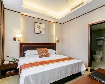 Jing Zhou Kai Le Hotel - Jingzhou - Schlafzimmer