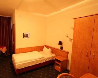 Garni Hotel Vier Jahreszeiten - Rösrath - Bedroom